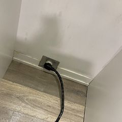 Behind the oven, after cleaning
