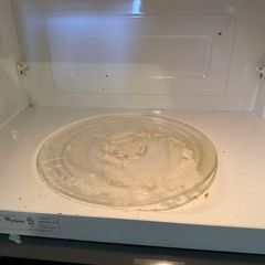 Inside the microwave, before cleaning